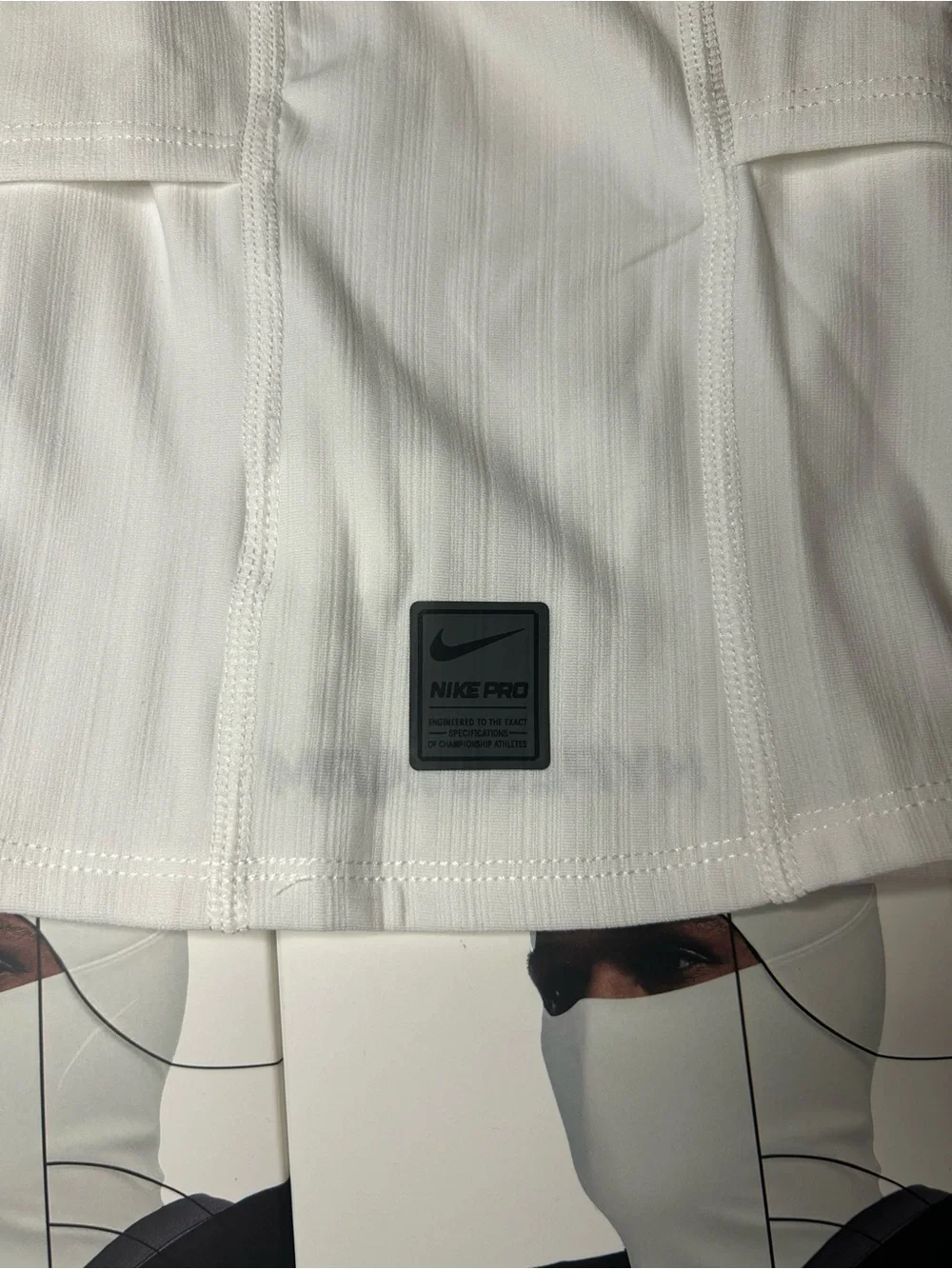 Nike White Performance Training Top with Black Logo Badge
